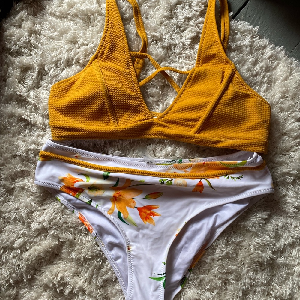 Large bathing suit. Never worn.
